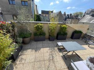 Appartements Duplex avec terrasse face a la cathedrale : photos des chambres