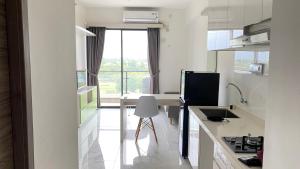 Fully Furnished with Pleasure 2BR at Sky House BSD Apartment By Travelio