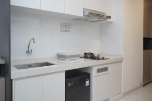 Fully Furnished with Tidy Design Studio at Sky House BSD Apartment By Travelio