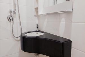 Fully Furnished with Tidy Design Studio at Sky House BSD Apartment By Travelio