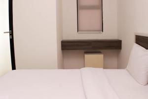 Cozy Stay Studio Urbantown Karawang Apartment By Travelio