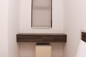 Cozy Stay Studio Urbantown Karawang Apartment By Travelio