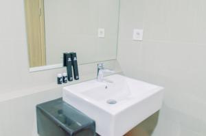 Elegant 1BR without Living Room at Bintaro Embarcadero Suites Apartment By Travelio