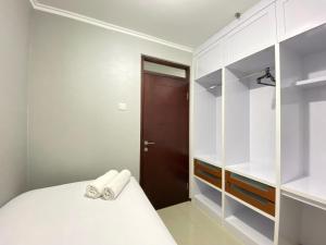 Comfy 2BR Apartment at Gateway Pasteur By Travelio