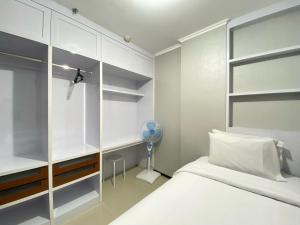 Comfy 2BR Apartment at Gateway Pasteur By Travelio
