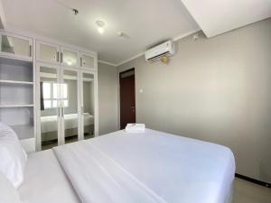 Comfy 2BR Apartment at Gateway Pasteur By Travelio