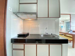 Comfy 2BR Apartment at Gateway Pasteur By Travelio