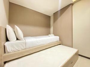 Relaxing 2BR at Gateway Pasteur Apartment By Travelio