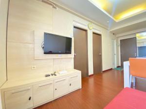 Cozy and Spacious 2BR at Suites @Metro Apartment By Travelio