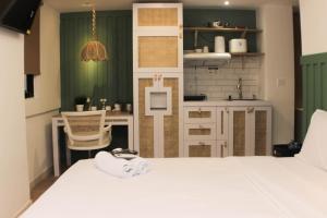 Minimalist Design Studio at Meikarta Apartment By Travelio