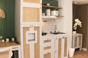 Minimalist Design Studio at Meikarta Apartment By Travelio