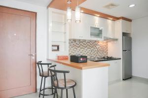 Warm and Cozy 3BR Apartment at The Royal Olive Residence By Travelio