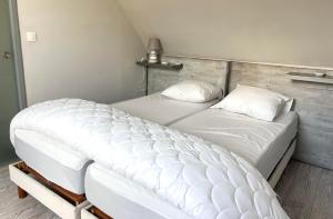 Maisons de vacances Les Tournaisiens, Cottage a 2 pas de Wimereux : photos des chambres