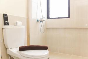 Spacious and Bright 2BR at Meikarta Apartment By Travelio