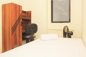 Spacious and Bright 2BR at Meikarta Apartment By Travelio