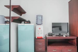 Compact Studio at Margonda Residence 1 Apartment By Travelio