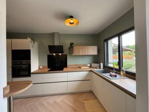 Maisons de vacances L-embrun - maison harmonieuse - proche de la mer : photos des chambres