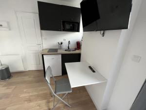 Appartements Vue sur les Toits - 2p Centre-ville : photos des chambres