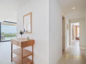 Apartamento con jardín y piscina privada en Higuerón West