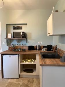 B&B / Chambres d'hotes Chambre au calme avec spa privatif gratuit sud aveyron les palmiers des causses : photos des chambres