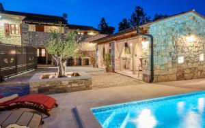 Rustic stone holiday house with pool