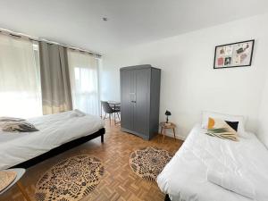 Appartements L-Emeraude Gare Un Sejour a Part : photos des chambres