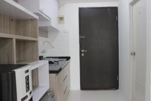 Spacious and Modern Studio Room Apartment at Grand Asia Afrika By Travelio