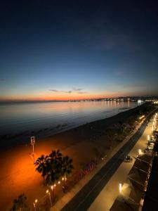 Sun, Sea and Serenity - Beachfront Apt with Sunset Views and Soothing Waves