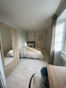 Appartements Maison Centre bourg : photos des chambres