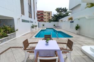 Hotel Axis Inn By GEH Suites