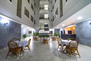 Hotel Axis Inn By GEH Suites