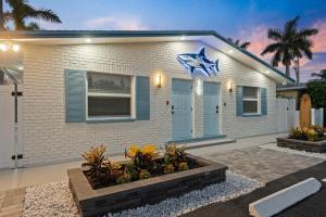 The Shark Tank Cocoa Beach - 2 2BR Units - 4BR Total - Each Unit Sleeps 5 - Walk to Beach & Downtown