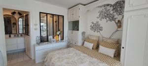 Appartements Appartement terrasse esprit loft vue sur mer : photos des chambres