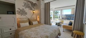 Appartements Appartement terrasse esprit loft vue sur mer : photos des chambres