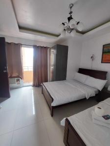 Experience OCEAN VIEW Rooms in The Heart Of Manila, Enjoy FREE ACCESS To The POOL, SAUNA, PLUS MASSAGE PROMO In Prime Location Near The US Embassy, NAIA, Makati, BGC, Mall of Asia, And Chinatown This Is A Limited-Time Offer, Book Now