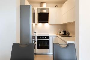 Bright 1BDR with Balcony & Parking