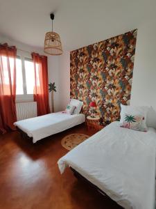 Appartements Les jardins Ducarouge 1 climatise : photos des chambres