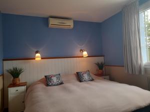 Appartements Maison Le Petit Bonheur : photos des chambres