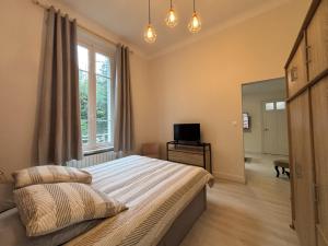 Appartements Luengoni - 1 chambre - Wifi - Proche Parc Thermal - 2 personnes : photos des chambres