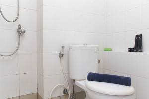 Simple and Cozy Living Studio Room at Bassura City Apartment By Travelio