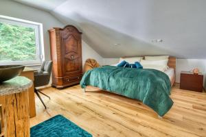 Penthouse mit Aussicht über den Wald