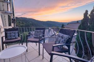 Penthouse mit Aussicht über den Wald