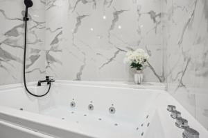 Appartements Studio avec jacuzzi & vue sur le parc Soubiran : photos des chambres