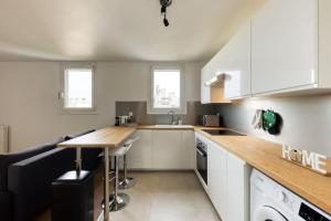 Appartements Logement cosy a 2 min de la gare : photos des chambres