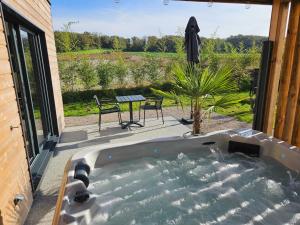 Chalet avec son jacuzzi privé