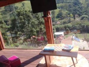 Charmosa Cabana Passarim, Gonçalves, Costas