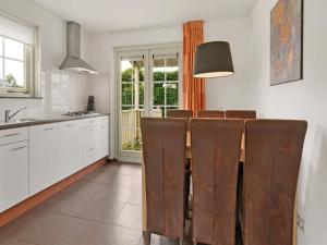 Bungalow by Water near Rotterdam with Sauna