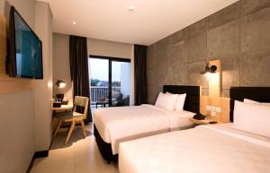 Phòng Hai Giường Đơn Loại Sang (Deluxe Twin Room)