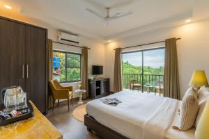 Locomo Boutique, Morjim - Cozy tropical stay, near beach