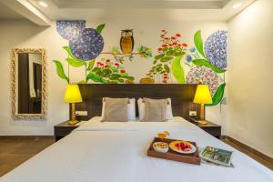 Locomo Boutique, Morjim - Cozy tropical stay, near beach